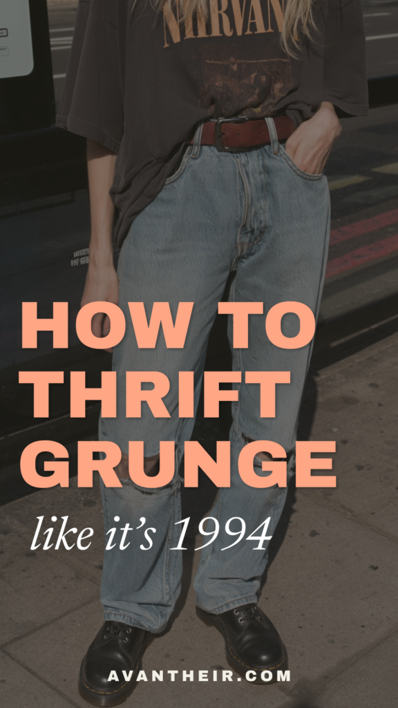 how-to-thrift-grunge-outfits How to thrift grunge like it’s 1994—Nirvana tee, ripped mom jeans and black Doc Martens on city sidewalk.